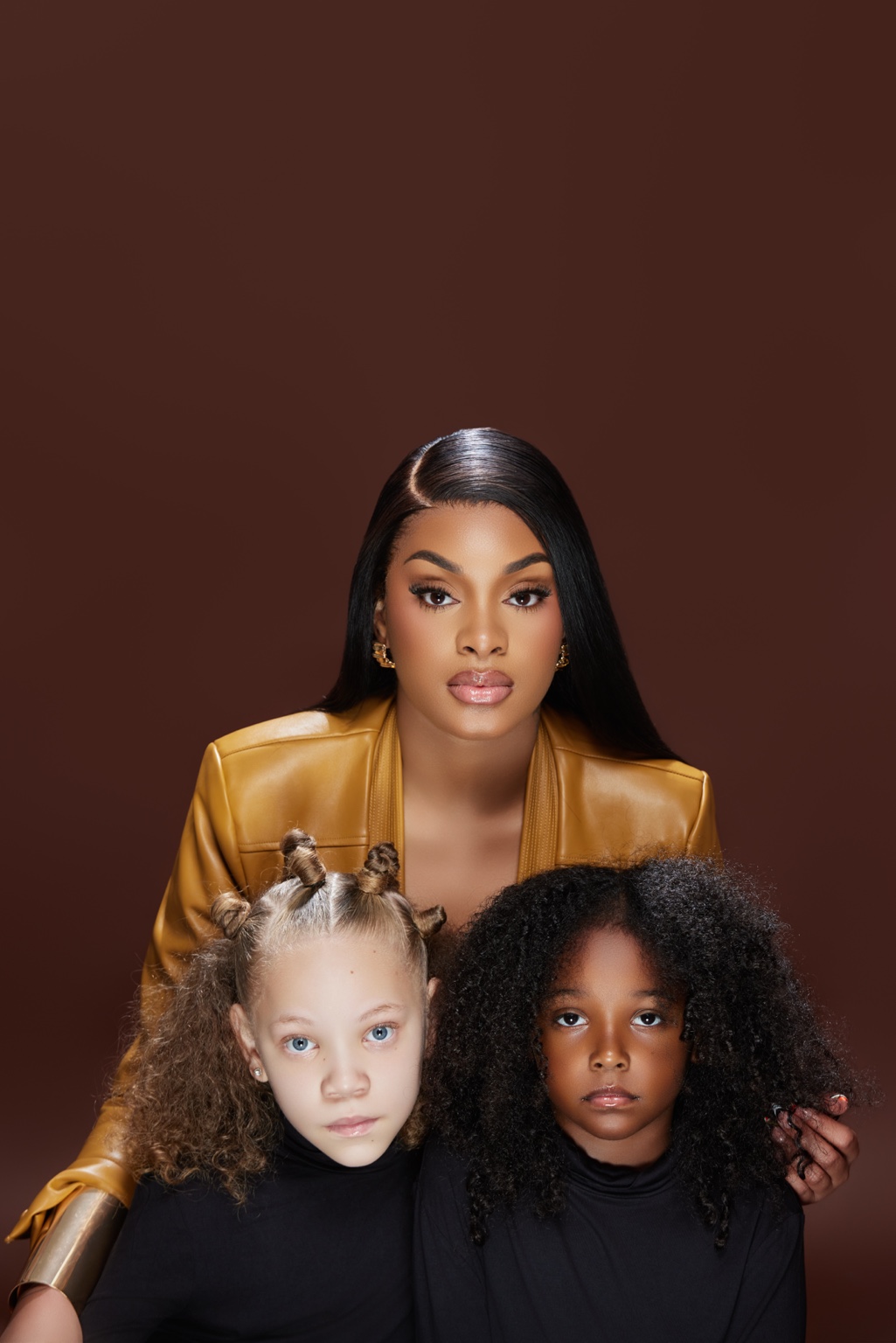 Kennedy with mini clients wearing natural hairstyles